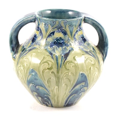 Lot 23 - William Moorcroft for Liberty & Co, a twin-handled vase