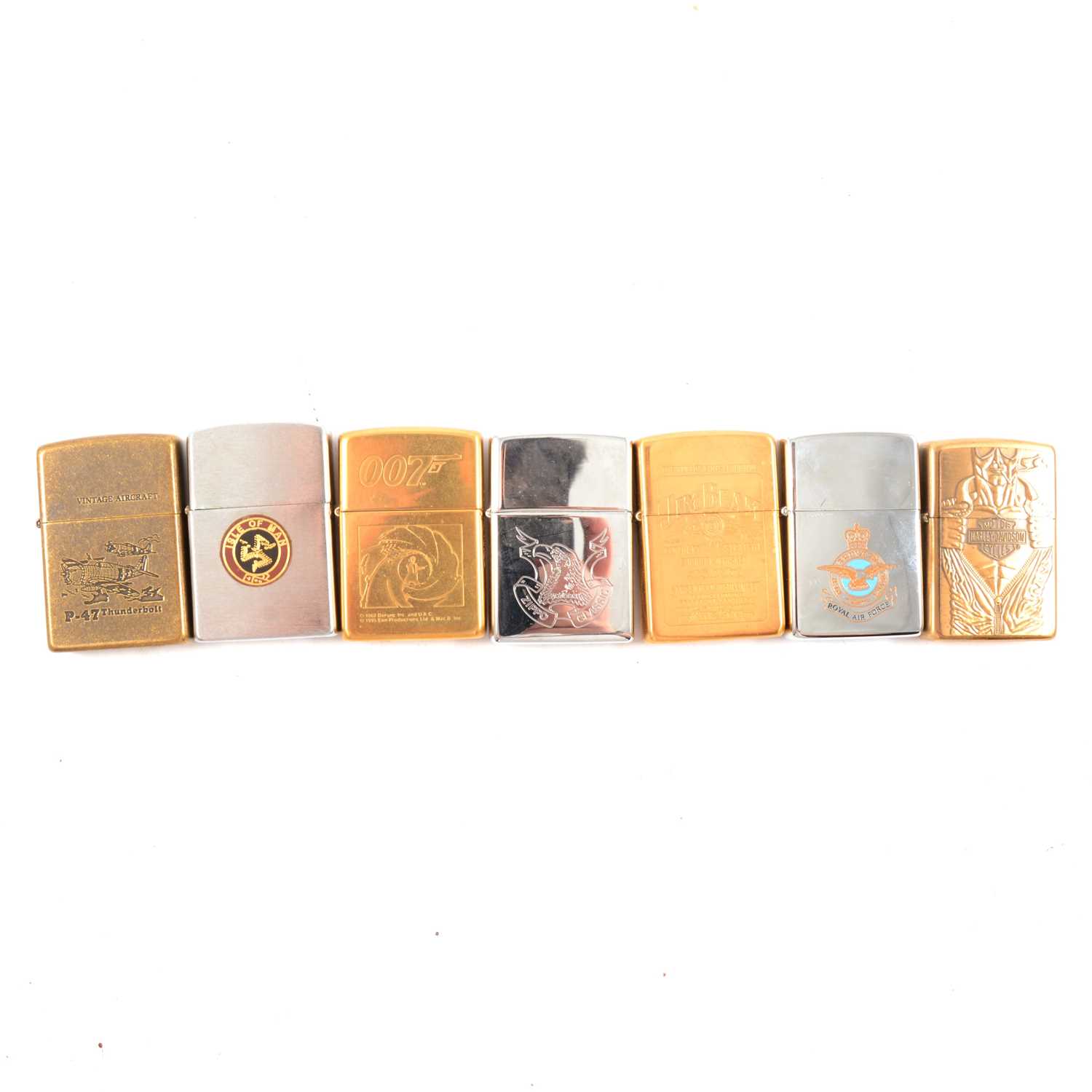 Lot 103 - Thirty-six Zippo lighters and one Nostalgia oil lighter.