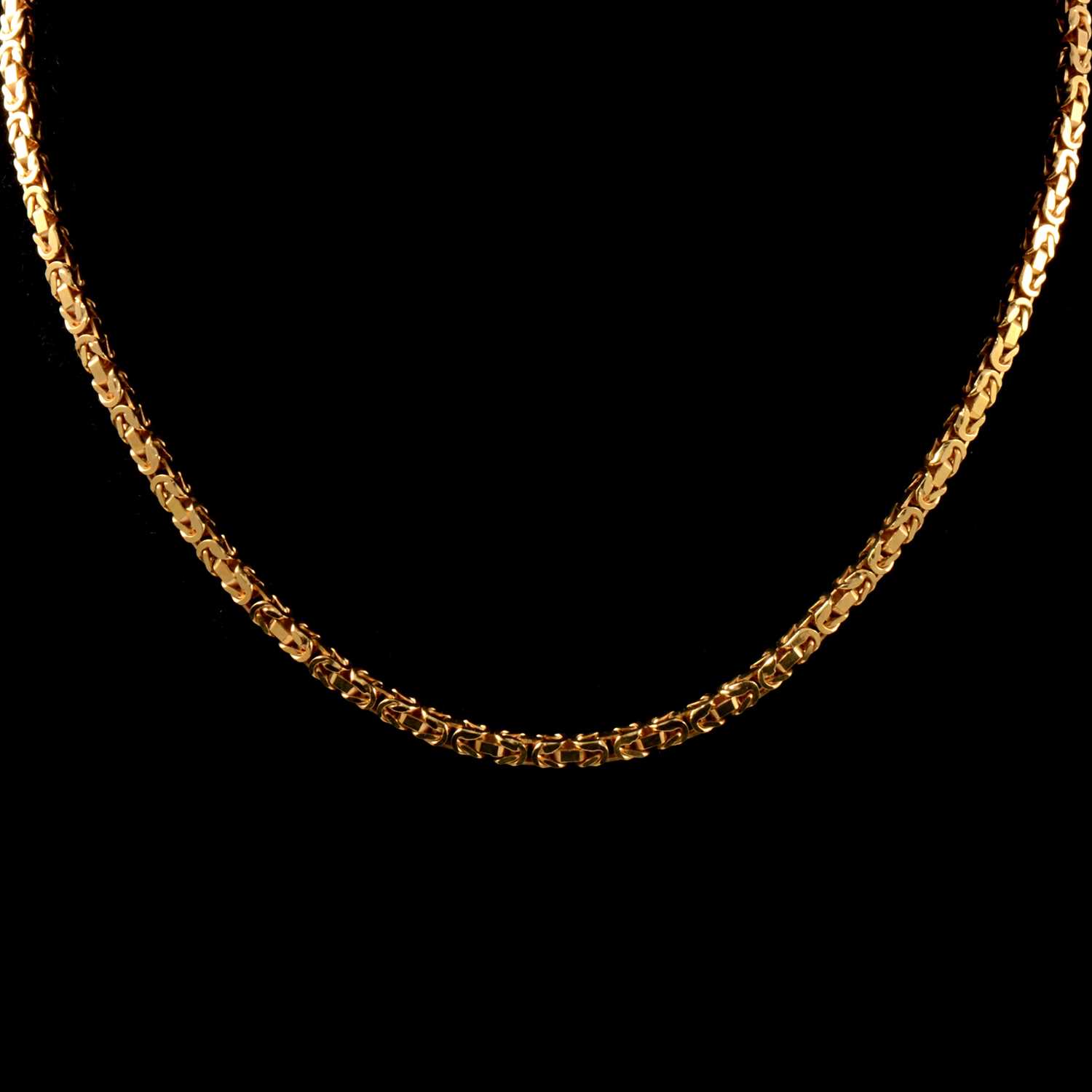 Lot 202 - A 9 carat yellow gold Byzantine link Kings pattern necklace.