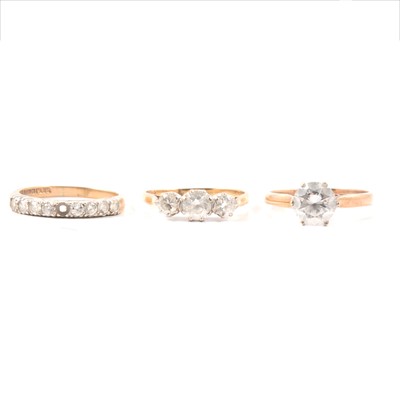 Lot 85 - Three rings set with synthetic white stones, 9 carat gold.