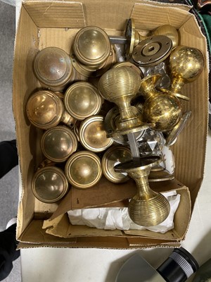 Lot 186 - A collection of brass and crystal doorknobs and fittings, crystal escutcheon covers, glass door plates.
