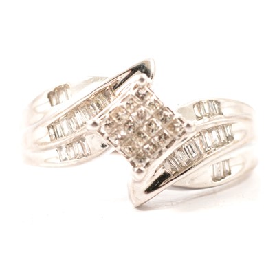 Lot 345 - A diamond cocktail ring.