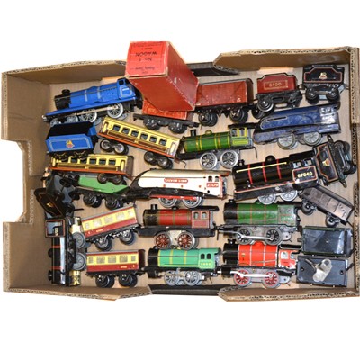 Lot 98 - One tray of O gauge model railway clock-work locomotives and passenger coaches