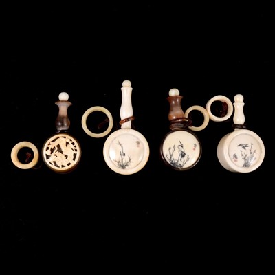 Lot 215 - Four Chinese bone and horn scent bottles with belt hoops