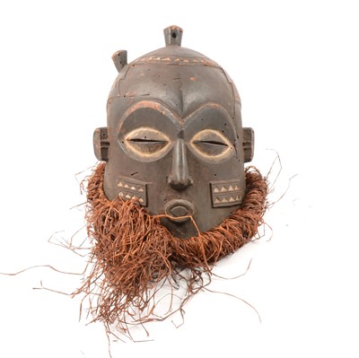 Lot 101 - Carved African tribal helmet mask, Bena Biombo, Democratic Republic of Congo