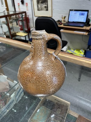 Lot 8 - Salt glazed stoneware Bellarmine jug