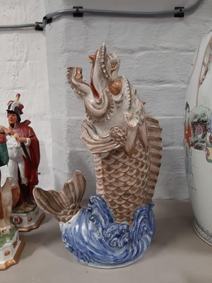 Lot 31 - Japanese porcelain serpent vase