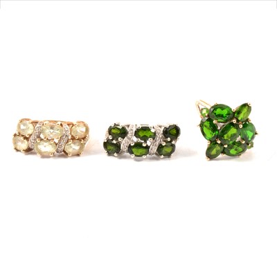 Lot 250 - Two diamond and green stone rings and a diamond and possible chrome diopside cluster ring.