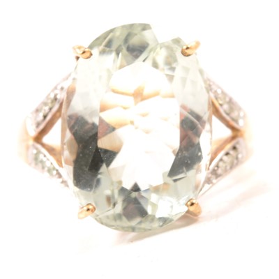 Lot 95 - A prasiolite quartz and white stone ring.