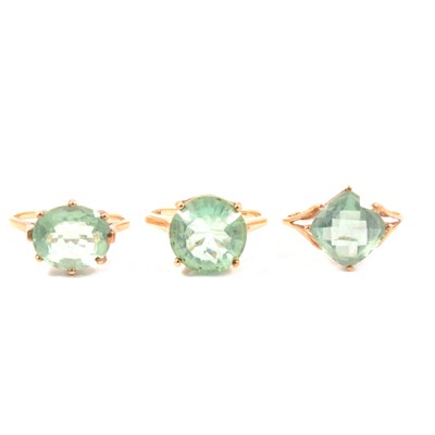 Lot 64 - Three fluorite solitaire rings with different style cuts.