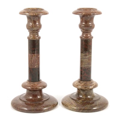 Lot 190 - Pair of red serpentine marble candlesticks