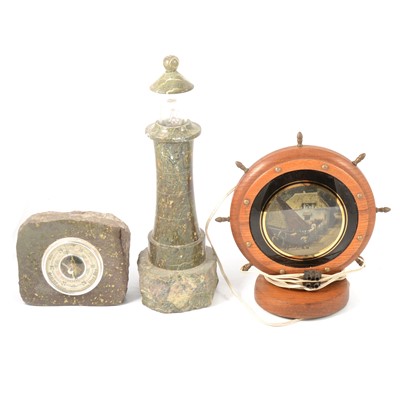 Lot 121 - A sepentine lighthouse lamp, sepentine barometer, ships wheel lamp and cigarette box.