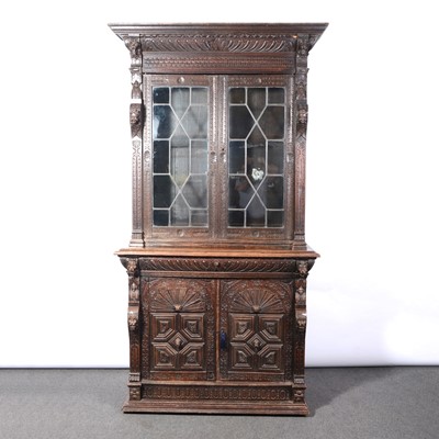 Lot 17 - Continental oak bookcase cabinet