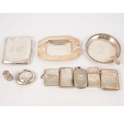 Lot 308 - Silver cigarette case, Barrett & Thompson, Birmingham 1917, silver ashtrays, vestas, and other small items.