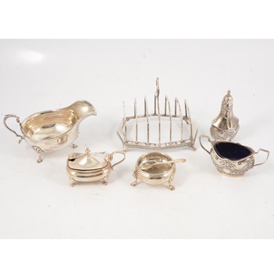 Lot 292 - Silver toast rack and condiments