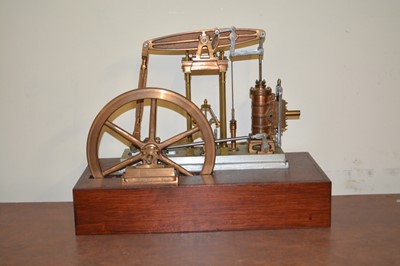 Lot 62 - Model beam engine, live steam, mounted on wooden plinth, unpainted, width of base 40cm.