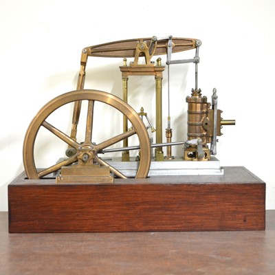 Lot 62 - Model beam engine, live steam, mounted on wooden plinth, unpainted, width of base 40cm.
