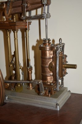 Lot 62 - Model beam engine, live steam, mounted on wooden plinth, unpainted, width of base 40cm.