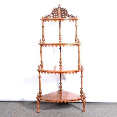 Lot 522 - Victorian figured walnut four-tier corner whatnot