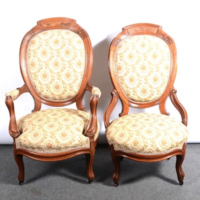 Lot 389 - Victorian oak wingback easy chair and a matching lady's chair