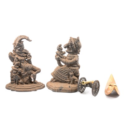 Lot 156 - Punch and Judy cast iron doorstops.