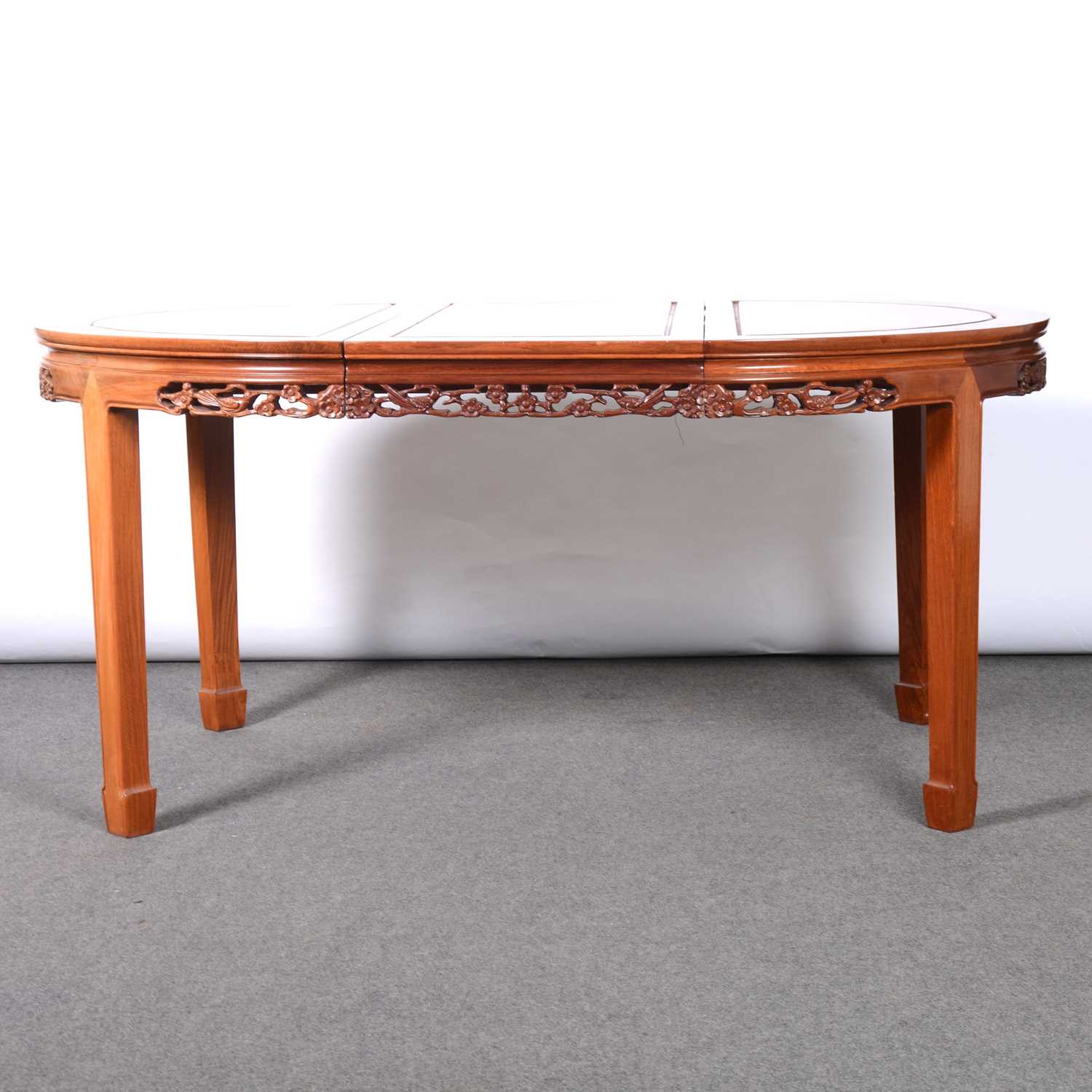 Lot 120 - Chinese hardwood extending dining table and eight chairs