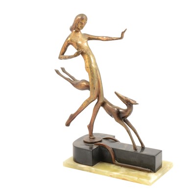 Lot 114 - Art Deco patinated spelter dancer with hound