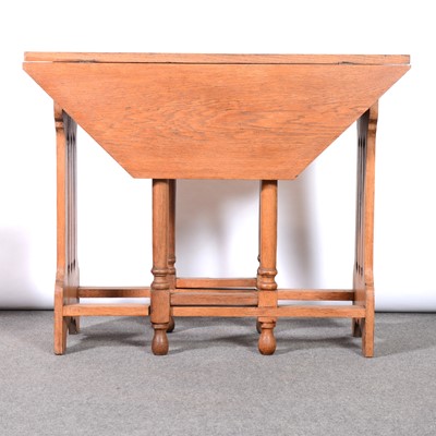 Lot 428 - English Arts and Crafts oak octagonal dropleaf table