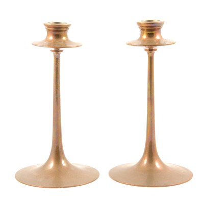 Lot 17 - Pair of Arts and Crafts brass candlesticks, in the manner of Dryad