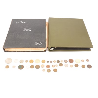 Lot 159 - Two stamp albums and a small bag of coins