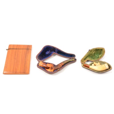 Lot 266 - Two Meerschaum pipes; and an olive wood card case.