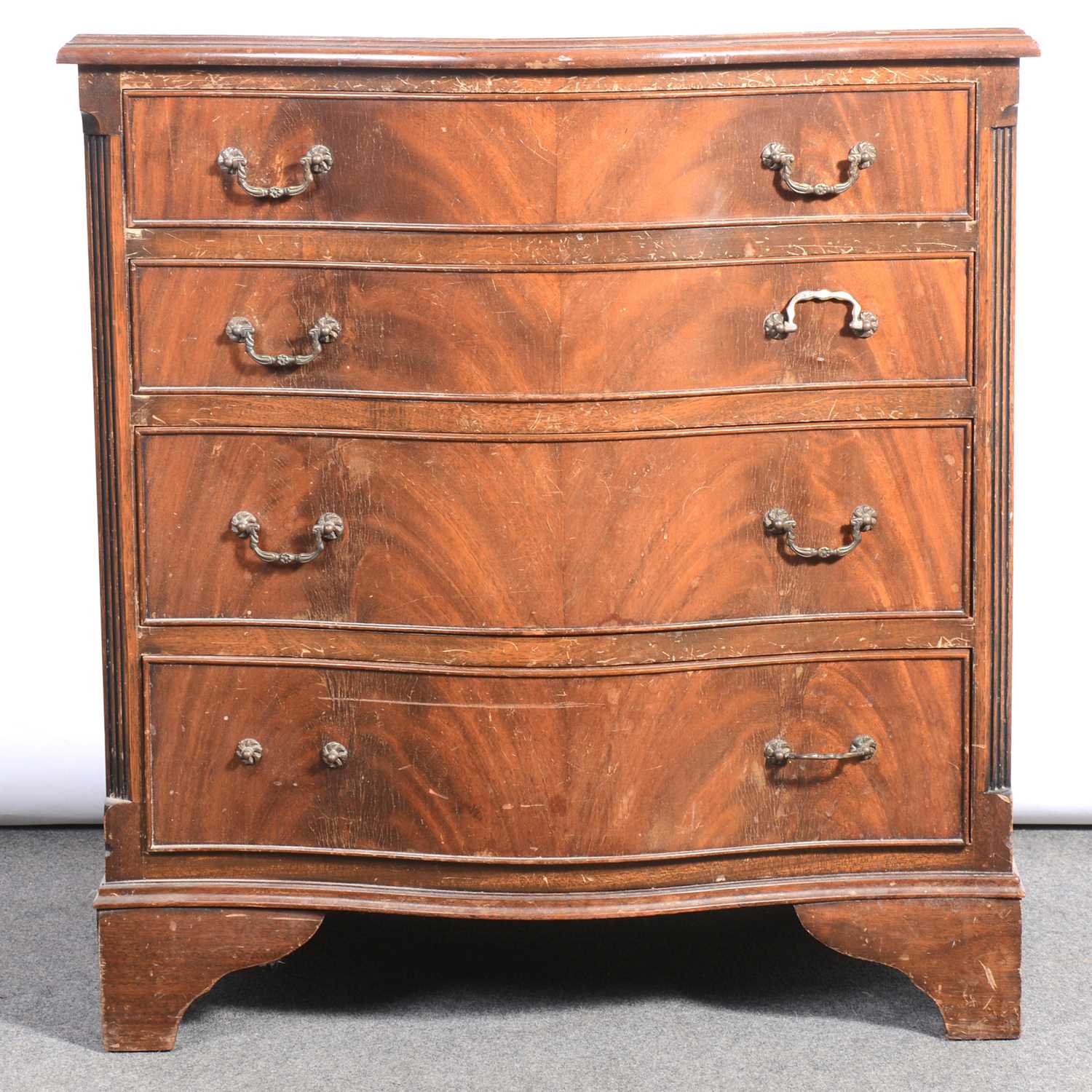 Lot 475 - Reproduction mahogany serpentine chest of drawers