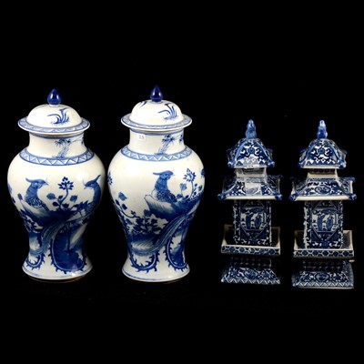 Lot 27 - Pair of Chinese blue and white covered vases, and a pair of pagoda vases