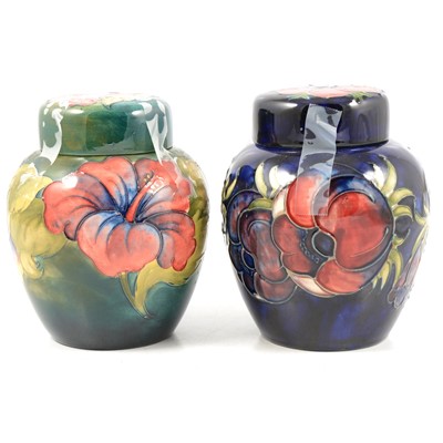 Lot 3 - Two Moorcroft pottery ginger jars and covers, 'Hibiscus' and 'Anemone' patterns.