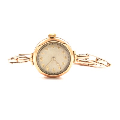 Lot 351 - A lady's vintage yellow metal bracelet wristwatch.