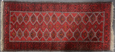 Lot 549 - Belouchi rug, red ground with two rows of tiles