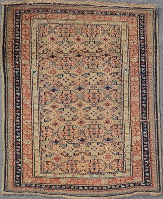 Lot 548 - Belouchi rug with two rows of tiles against a sand-coloured ground