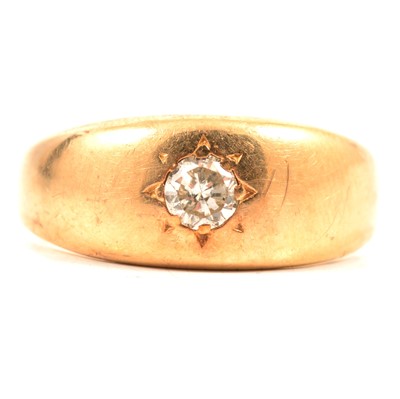 Lot 114 - A gypsy set diamond ring.