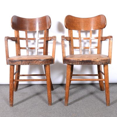 Lot 25 - Two oak and ply office chairs, early 20th century