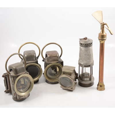 Lot 162 - Five vintage hand lamps, miner's lamp, fire hose nozzle and other metalwares.