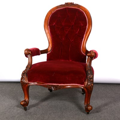 Lot 456 - Victorian walnut easy chair, carved and...