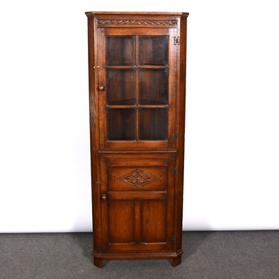 Lot 386 - Reproduction oak freestanding corner cupboard, probably Old Charm