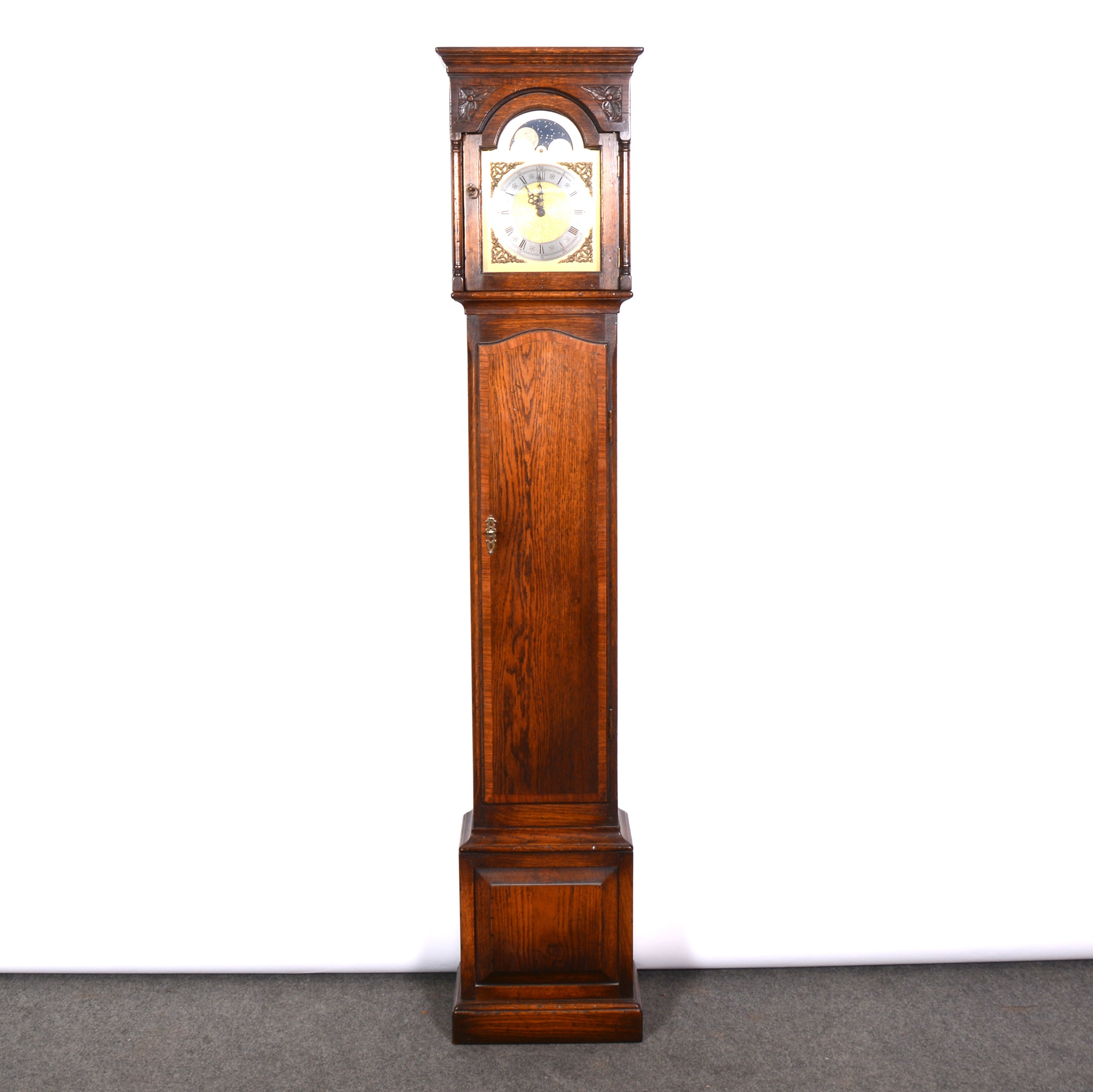 Lot 374 Reproduction oak grandmother clock,