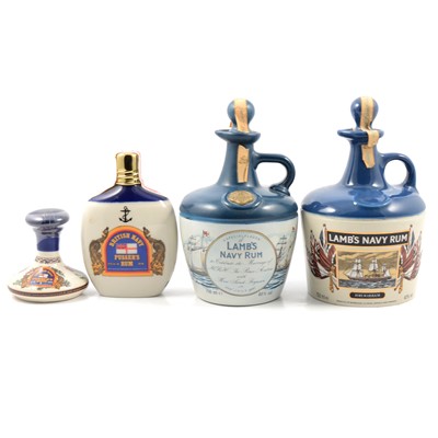 Lot 100 - Two Lamb's Navy Rum stoneware flagon, and two other rum flasks