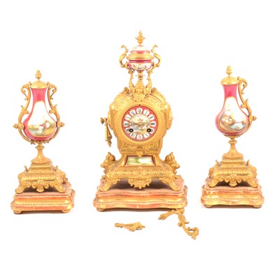 Lot 104 - French gilt metal three piece clock garniture