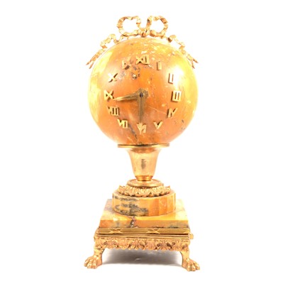 Lot 98 - Reproduction French sienna marble and gilt metal balloon-shape mantel clock
