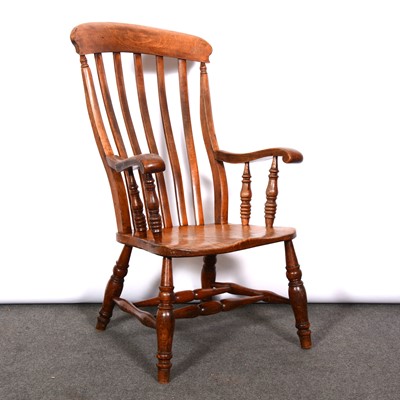 Lot 379 - Victorian elm and beech farmhouse elbow chair,...