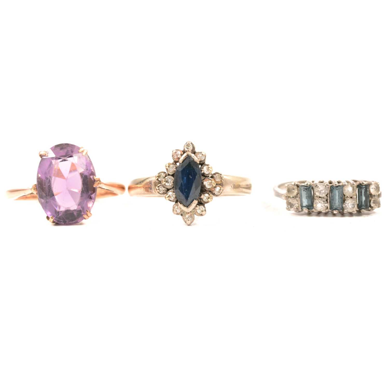 Lot 54 - Three dress rings.