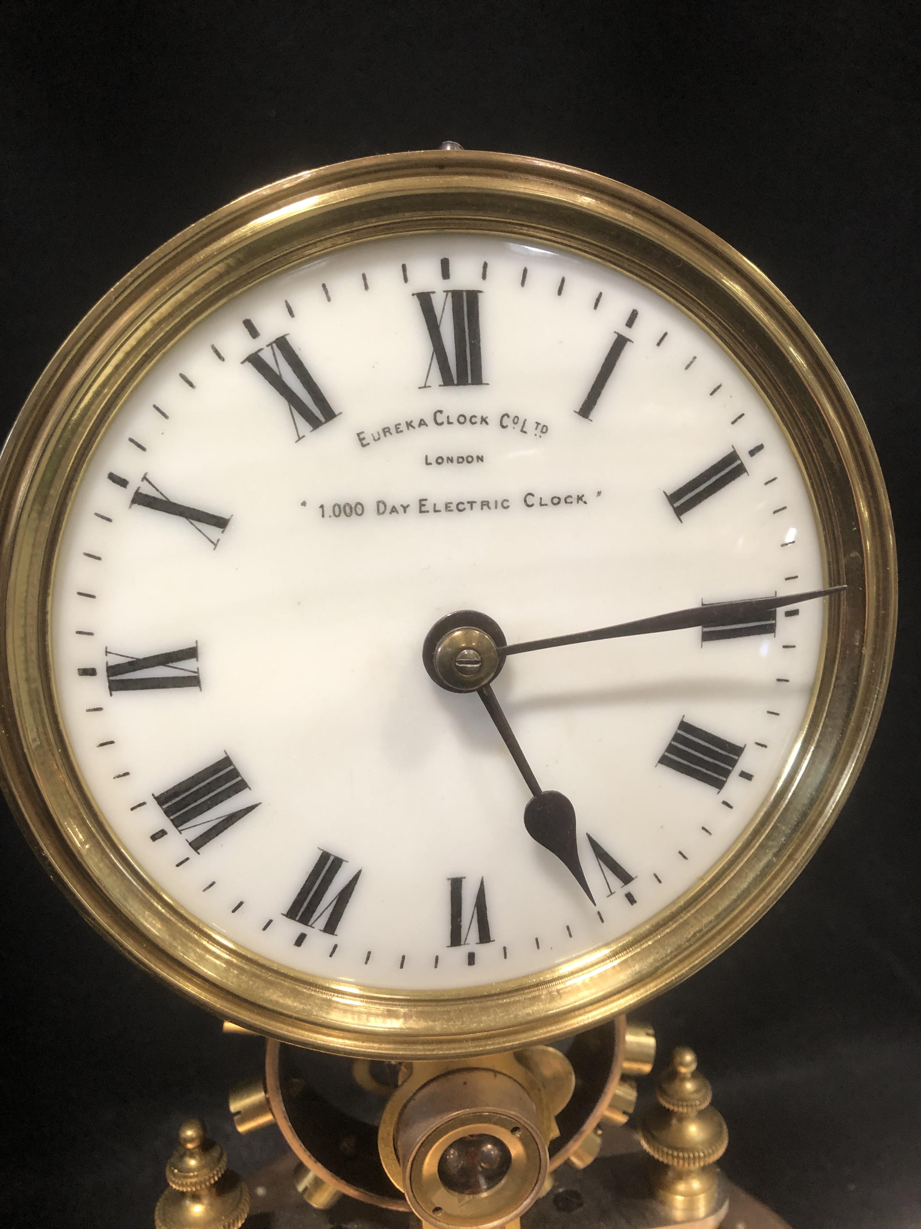 Lot 141 Eureka 1000 day electric clock,