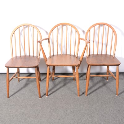 Lot 105 - Ercol, a trestle dining table and six hoop-back chairs